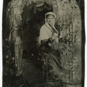 Woman in shawl with Gate