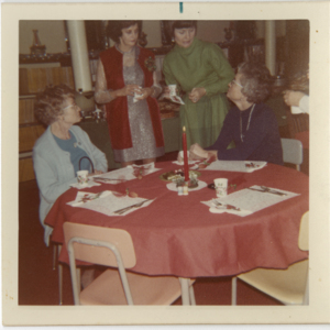 Holiday Party at the Library: four women