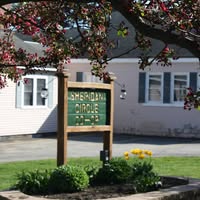 Photo of welcome sign at Sheridan Circle co-op